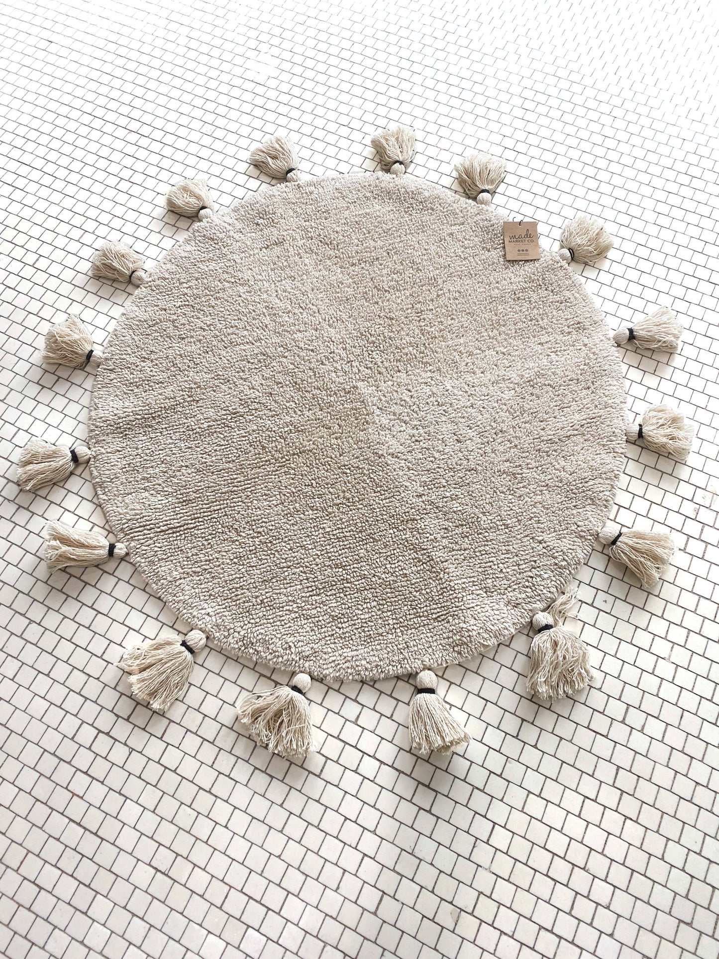 Round Tufted Rug with Tassels